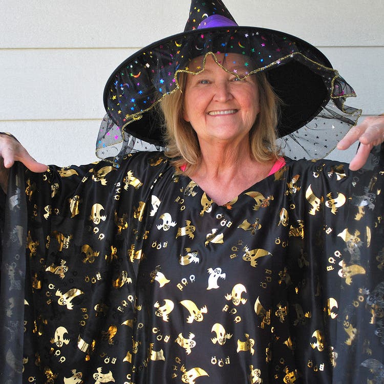 Halloween witch costume with gold accents