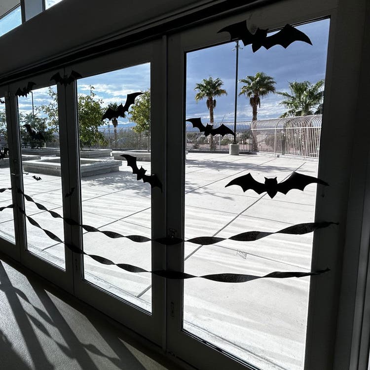 Halloween bat decorations on glass doors