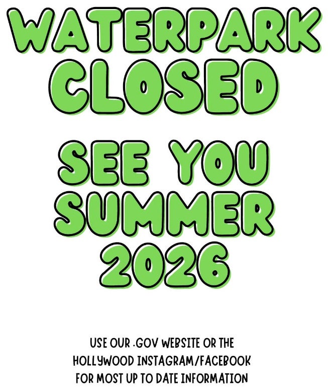 A bold green text announcement informs viewers that the waterpark is closed and will reopen in summer 2026. The message encourages users to visit the official government website or Hollywood social media pages for updates. The design features large, playful typography with a clean white background.